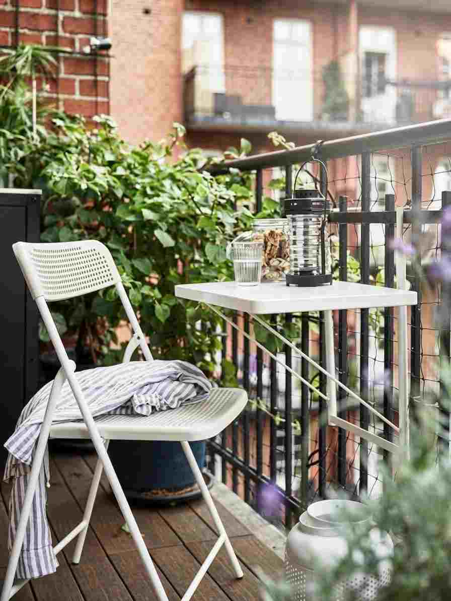 The UrbanBalcony Rail-Mounted Folding Table & Chair Set
